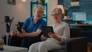 The Best Foods to Boost Energy and Vitality After 60 25 Grandparents using smartphone and digital tablet at home