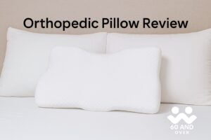 Wisconsin Senior Communities 7 Orthopedic cervical pillow displayed on a neatly made bed in a softly lit bedroom, featured in 60 And Over’s orthopedic pillow review