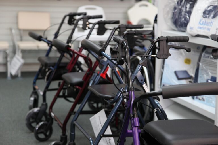 Blog List 22 A row of walkers and rollators displayed in a medical supply store, representing different mobility aid options for seniors.